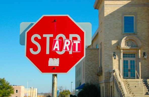 stop sign with OP covered up with ART so it spells START