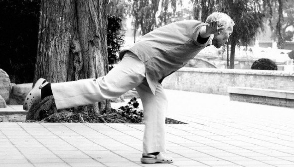 You don't need to lift weights to strength train. Balancing like this man is a great way to train.